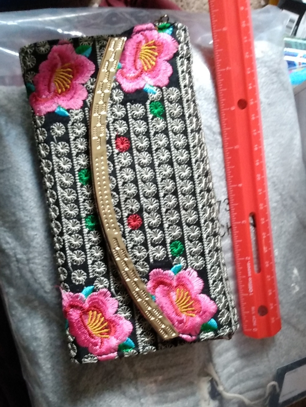 Floral Embroidered Black Clutch with Gold Frame